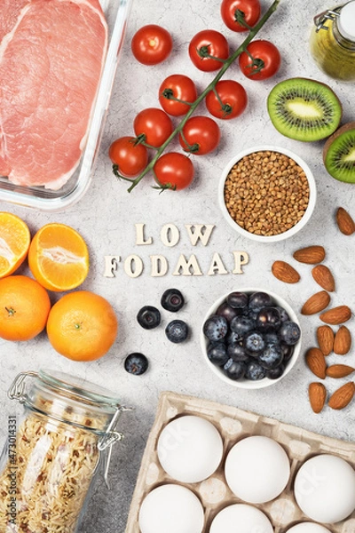 Fototapeta Diet food. Various ingredients with low fodmap content. Therapeutic diet. View from above.