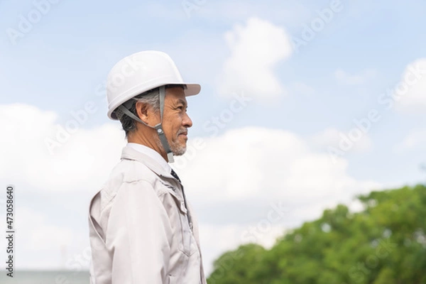 Fototapeta 作業服のシニア男性