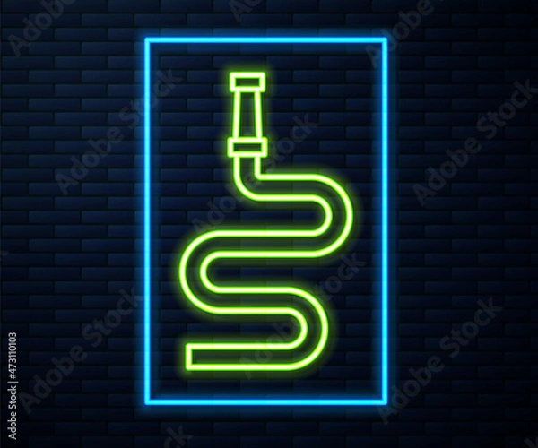 Fototapeta Glowing neon line Fire hose reel icon isolated on brick wall background. Vector
