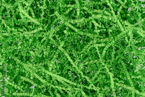 Fototapeta Green crinkle shredded papers for gift box and basket filling. Backgrounds, gift and ornamental papers concepts. Horizontal texture close-up.