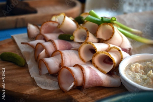 Obraz lard with a layer of meat on a wooden board