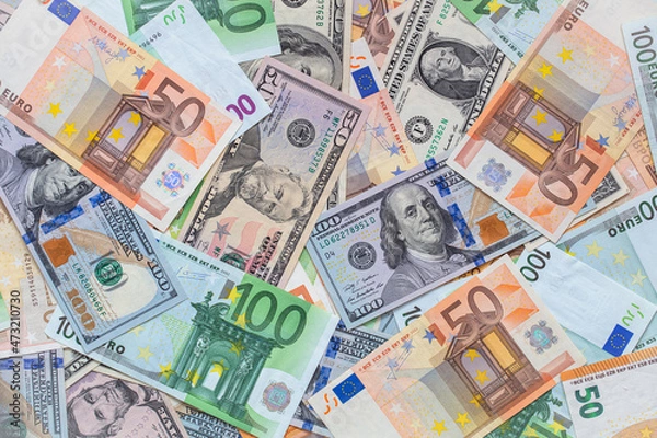 Obraz Closeup of dollar and euro banknotes