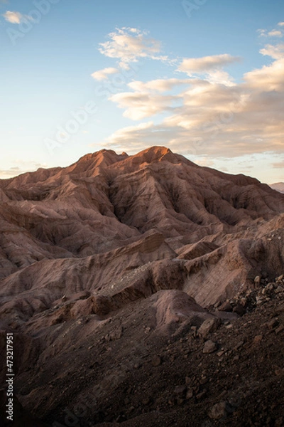 Fototapeta A red mountain, on a landscape similar to mars, at sunset, in desert of Atacama, Chile