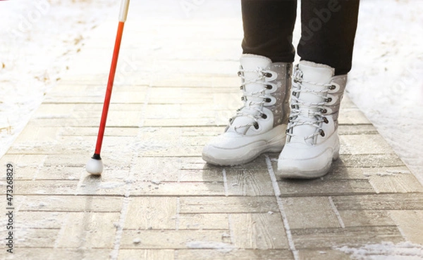 Obraz Inclusion, a blind man with a cane for the blind disabled