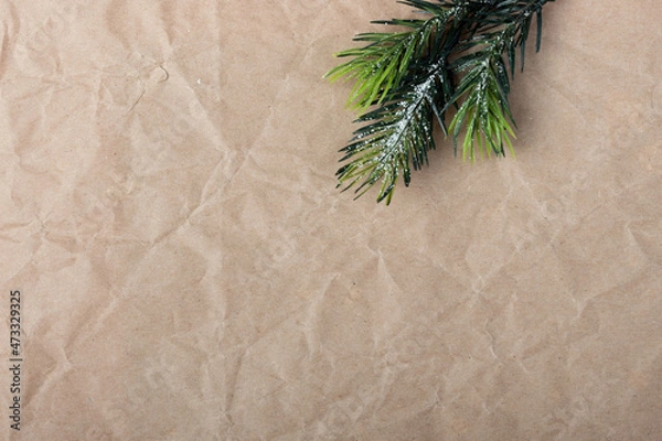 Obraz Winter Holiday themed background image on craft wrapping paper. Christmas and New Year message on social media, email and cards. 