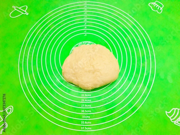 Obraz Ready-made dough on silicone mat