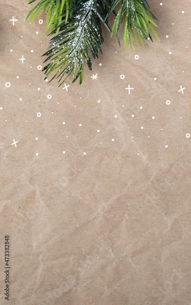Obraz Winter Holiday themed background image on craft wrapping paper with drawing. Christmas and New Year message on social media, email and cards.

