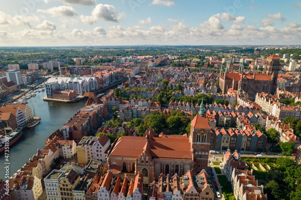 Fototapeta Gdansk. A city by the Baltic Sea on a sunny beautiful day. Aerial view over the seaside city of Gdańsk.