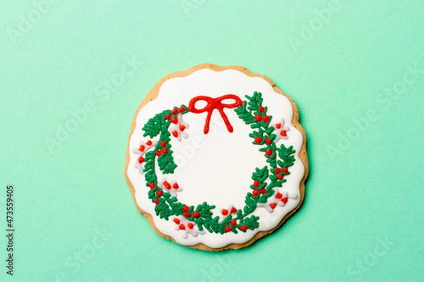 Fototapeta Christmas composition with decorations and cookies on a mint background