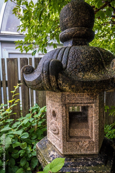 Obraz stone statue in the garden