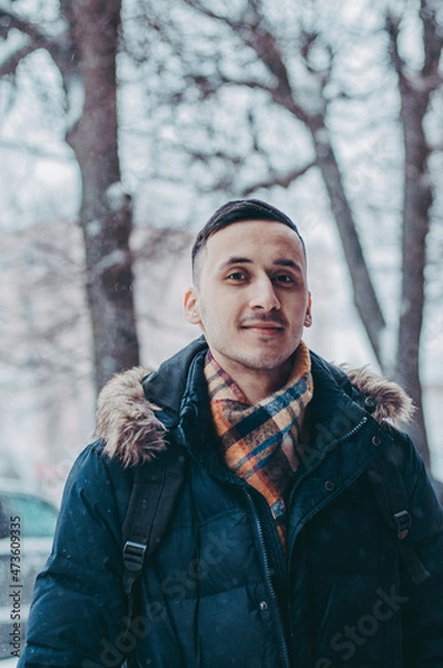 Obraz man in winter forest