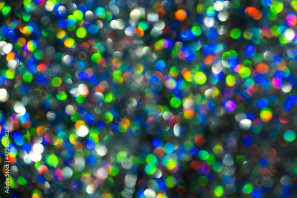Fototapeta Abstract defocused christmas lights for decorative design.
