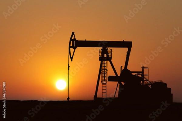 Obraz oil pump silhouette in sunset