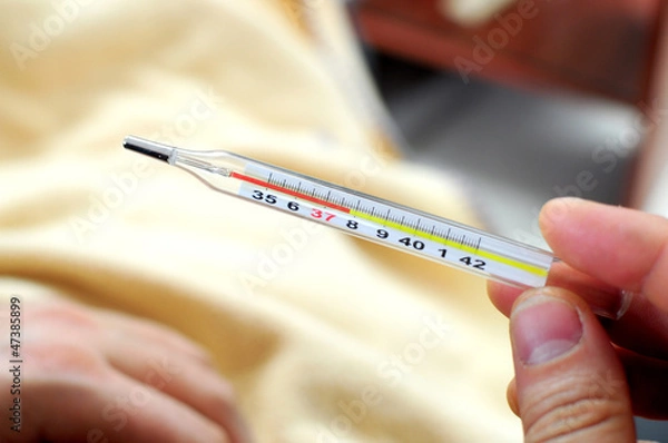 Fototapeta Thermometer showing 37.8 degrees