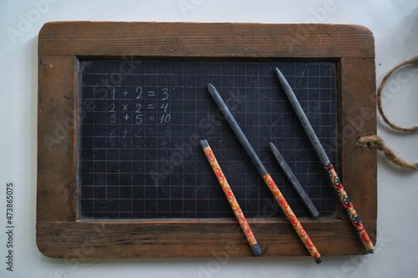 Obraz An old-fashioned board for teaching mathematics at school