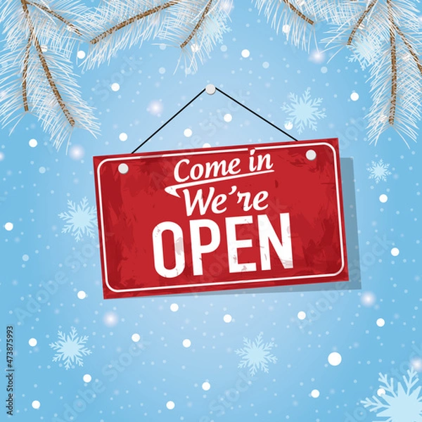 Fototapeta Come in We're Open. Winter concept background. Red sign for the store