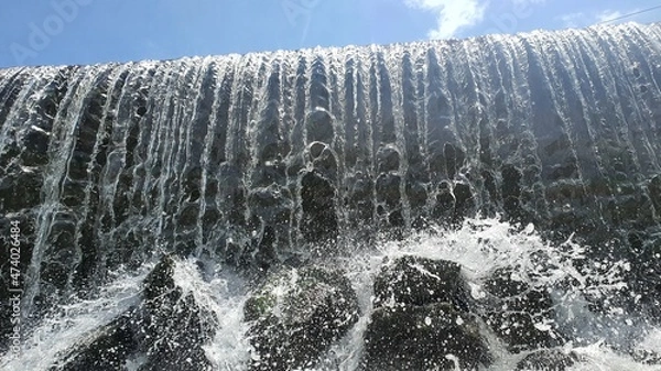 Fototapeta icicles on the rocks