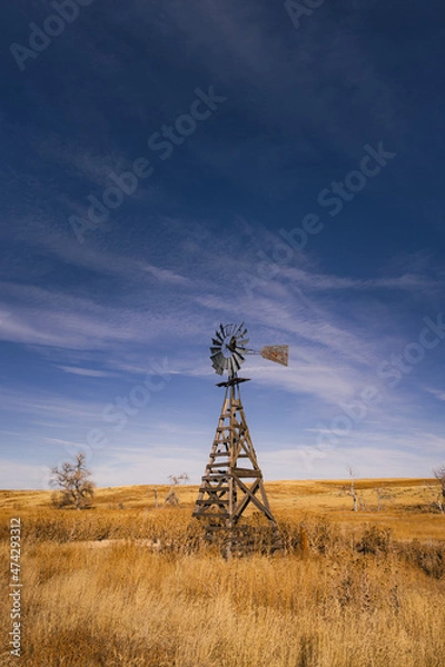 Fototapeta Old Windmill in an open field