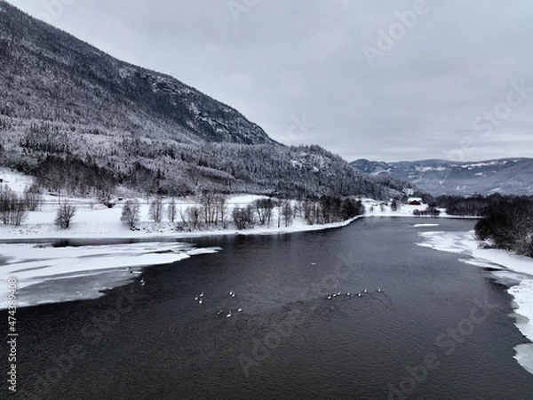Fototapeta Winter landscape from Norway, Hallingdal. Cold and snow. Shot with a drone high up in the sky. DJI mavic 3.