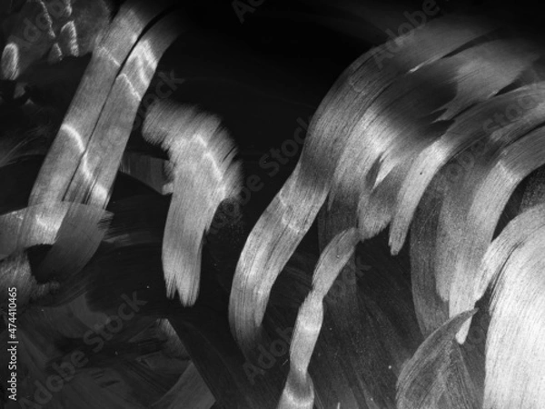 Fototapeta Dirty tablet. Fingerprints form drawings made with dust, moisture and grease marked with fingers on the touchscreen tablet or smartphone screen. Close up.