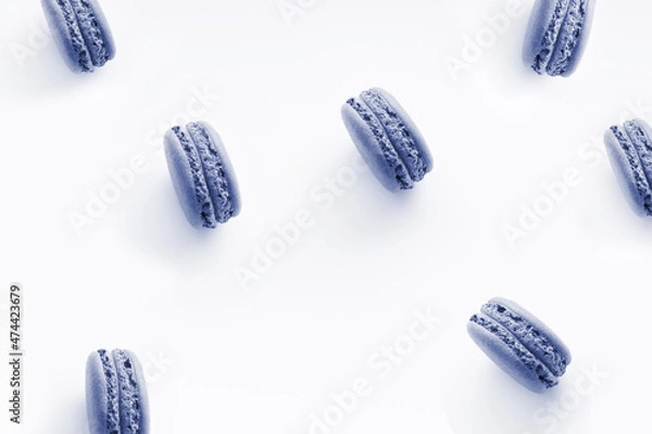 Fototapeta Sweet french desserts of color macaroons or macarons isolated at white background. Color of the year 2022. Main trend concept.