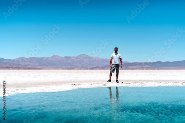 Fototapeta person on salt flats