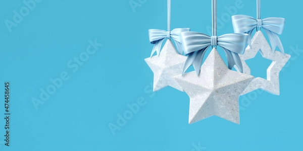 Fototapeta 3d illustration of Christmas decorations. Silver stars with light blue bows. The picture is in soft blue tones, horizontal format with space for text.