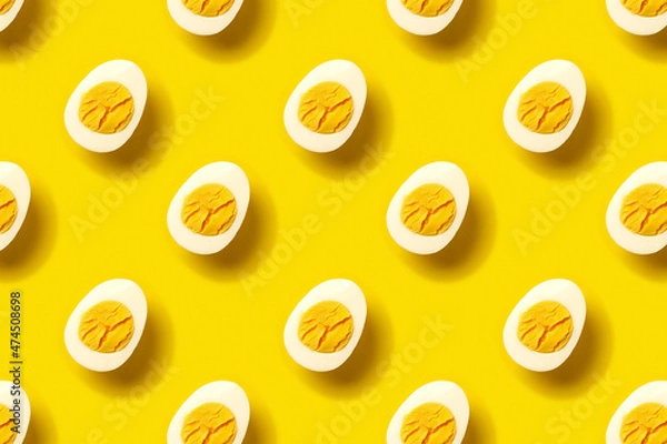 Obraz 
Boiled eggs pattern on a yellow background.