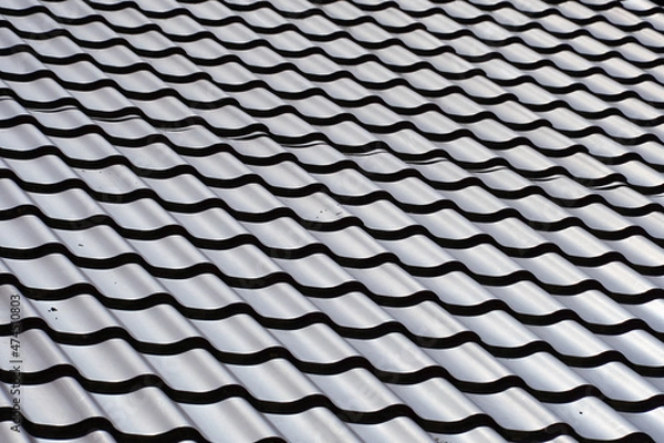 Fototapeta View of the new tiled roof. Blank background for text and design. Exterior of a country house. Copy space