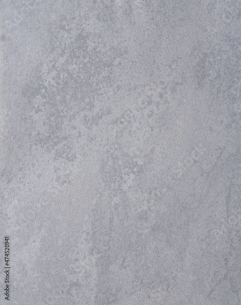 Fototapeta Gray irregular surface for background, possibly paper or plastic