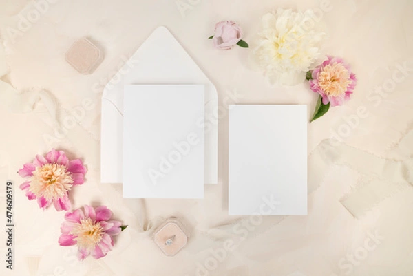 Fototapeta Beautiful romantic bridal blank stationery invitation flat lay with fresh flowers and velvet ring box
