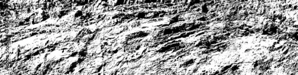 Obraz Grungy cragged bumpy pitted cavity stone facade, split layer gap.Ruined cracked shattered worn rough hiking canyon.Old ragged grunge steep marble cliff. Grand vintage crannied damaged impressive gorge