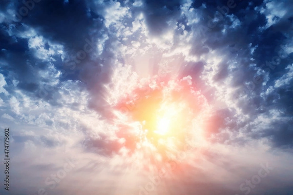 Fototapeta Beam of light through the clouds. Rays of light shining through clouds. Ultraviolet rays concept. Weather conditions concept. Presence of god in some religions.