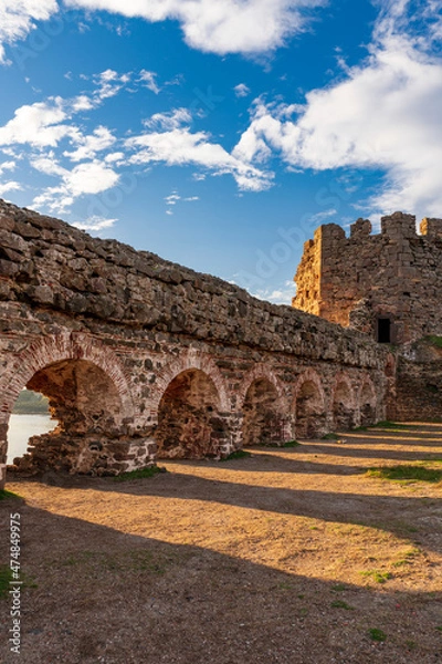 Obraz Rumelifeneri Castle with old fort. Blue sky and natural white clouds.