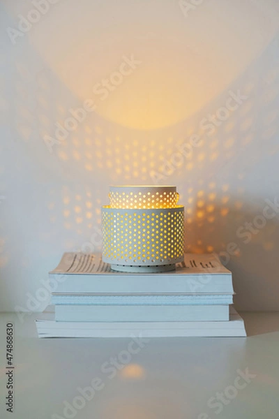 Obraz Home cozy reading books by the light of the lamp