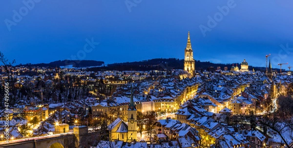Obraz Panorama of the town center of Bern in winter blue hour with snowy and illuminated buildings, Rosengarten, Bern, UNESCO, Switzerland