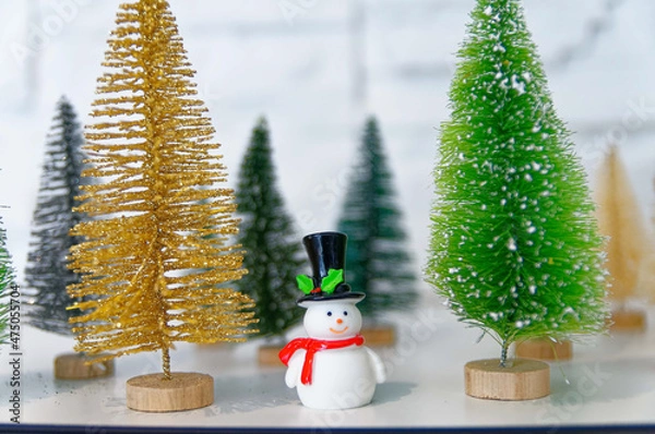 Obraz Decoration figurines with snowman and christmas trees