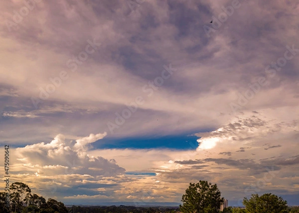 Fototapeta blue sky with contrasting clouds