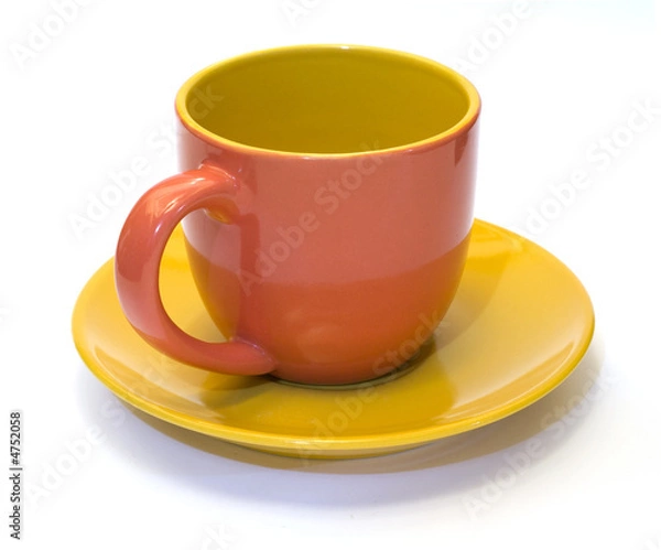 Fototapeta glazed pottery coffee cup and saucer with white background