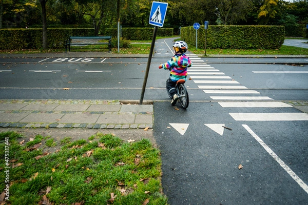Obraz child riding bike