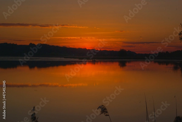 Fototapeta sunset over the river