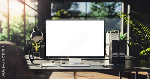 Obraz Computer all-in-one with a blank screen front in industrial loft green ecological office interior