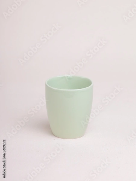 Obraz green tea cup on a light background