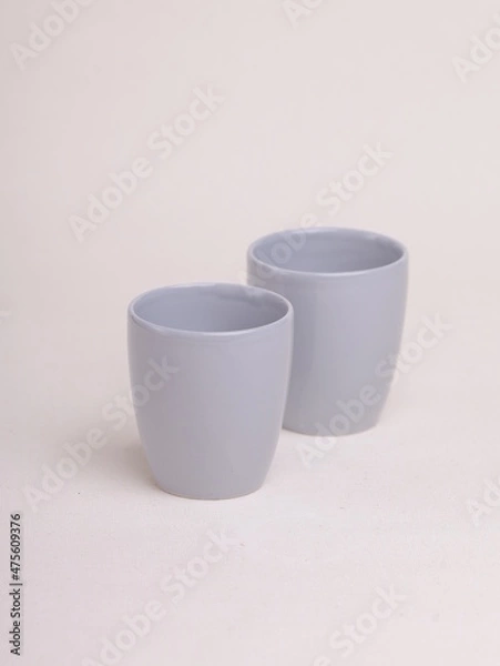 Obraz gray ceramic cup on a light background