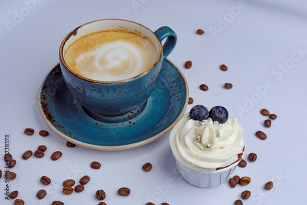 Obraz Chocolate cupcakes and coffee on craft paper