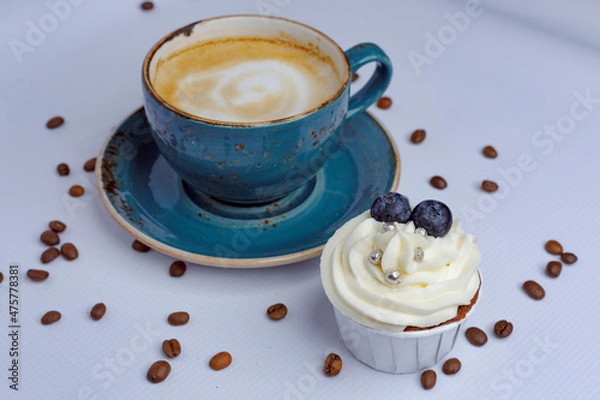 Obraz Chocolate cupcakes and coffee on craft paper