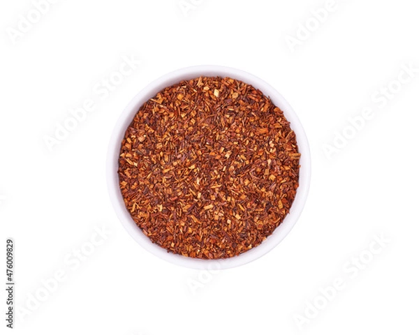 Fototapeta Dry rooibos tea in white bowl isolated on white background. Healthy drink.