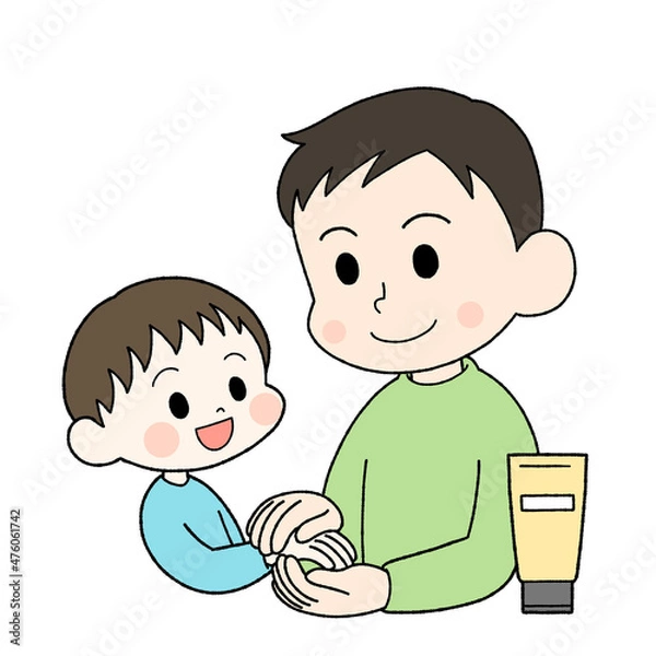 Fototapeta 子供にハンドクリームを塗ってあげる父親