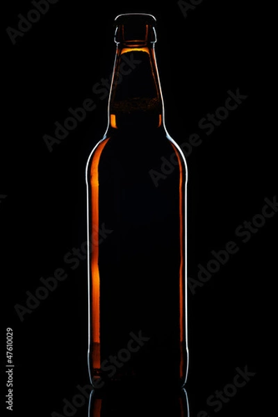 Fototapeta Beer botle on black background