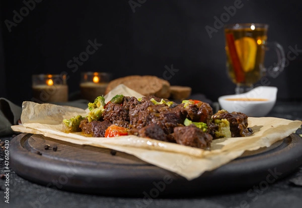 Fototapeta grilled beef with vegetables on wooden board